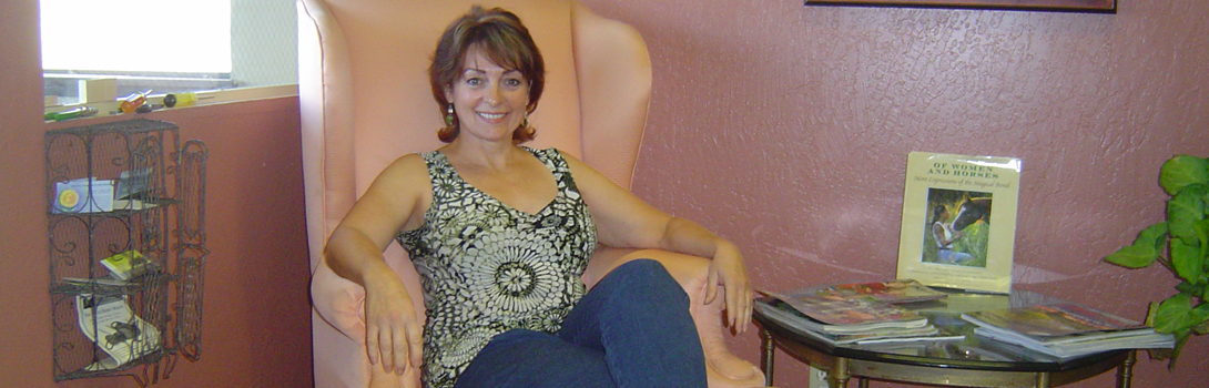 Delaya sitting in her chair